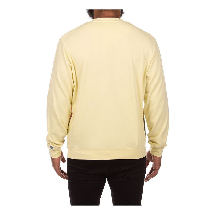 Model wearing BBC Wax Yellow BB Free Crewneck in a casual street style outfit