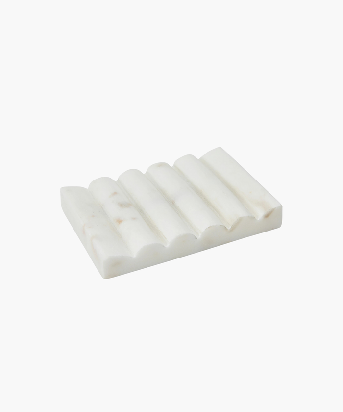 A rectangular white marble soap dish with a wavy, textured surface, conveying an elegant and natural aesthetic. | Wildwood Home Co.