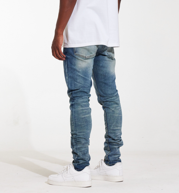 Detailed shot of the Crysp Denim Atlantic Medium Wash Denim Jeans (CRYSPSUM24-027) fabric texture and wash