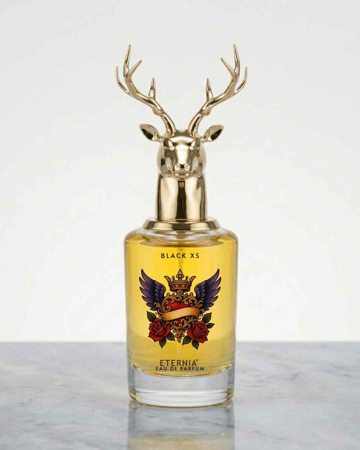 Eternia eau de parfum bottle with gold deer antler cap, labeled Black XS