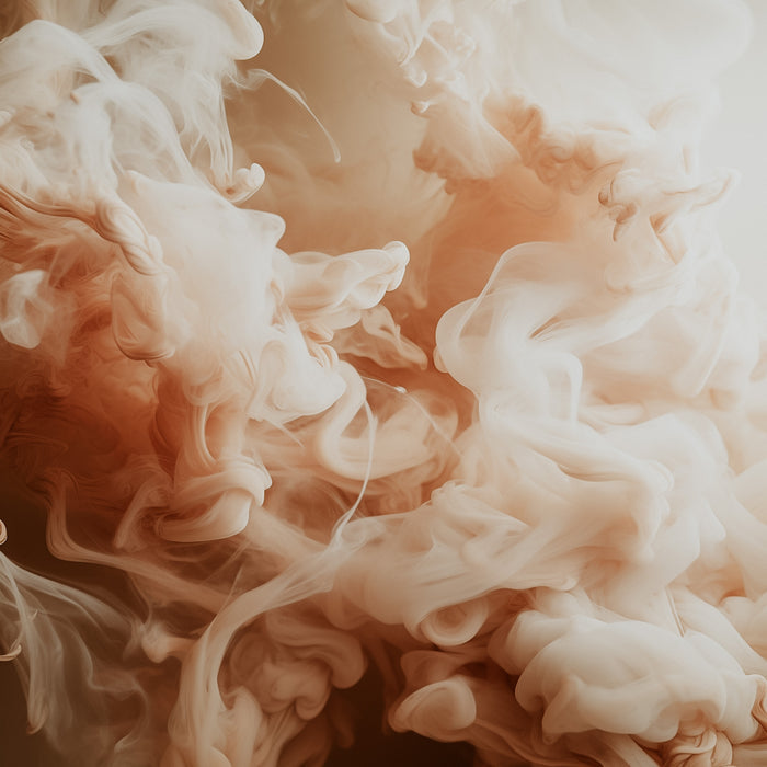 Abstract image of smoke in shades of beige and brown, resembling a fragrance cloud.