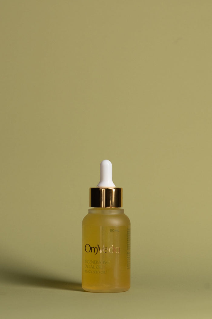 OmVeda regenerative facial oil amber dropper bottle with gold cap, 50 ml