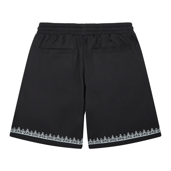 Close-up of the black fabric shorts showcasing the sleek design and high-quality material