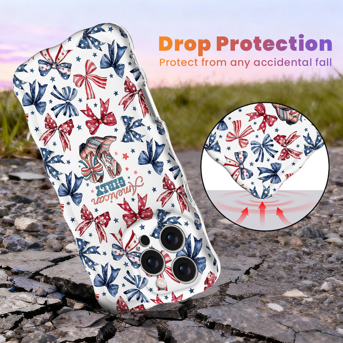 Trendy wavy iPhone case featuring a patriotic coquette pattern of red, white, and blue bows, stars, and watercolor cowboy boots with a high-gloss finish.