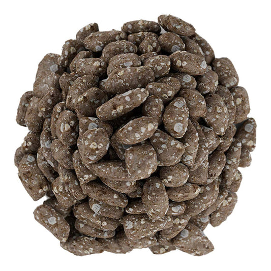 Pile of reddish-brown zazen Water Anti-Bacterial Stones on a white background.