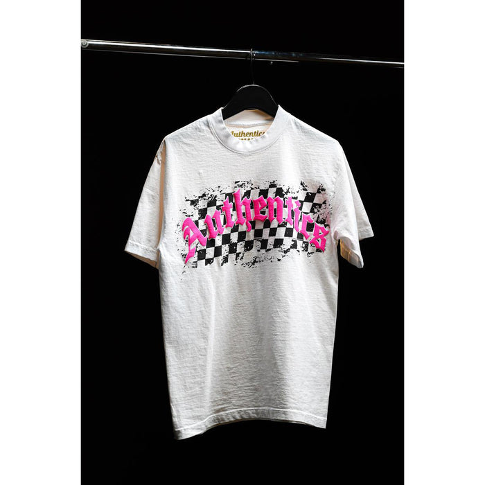 Close-up of white and pink Arch Checkered Tee by Authentics on a hanger