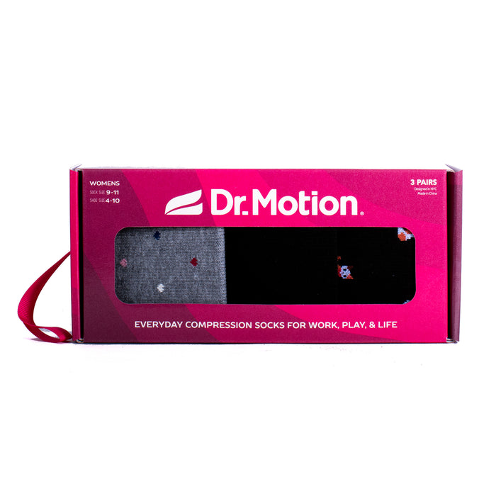 Gift box containing three pairs of women's compression socks in various colors and patterns.