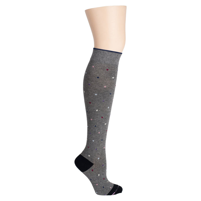 Knee-high gray socks with multicolored polka dots and a dark cuff.