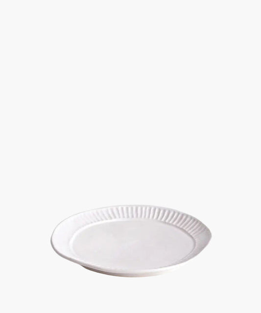 White ceramic plate with decorative rim on a white background. | SW Home
