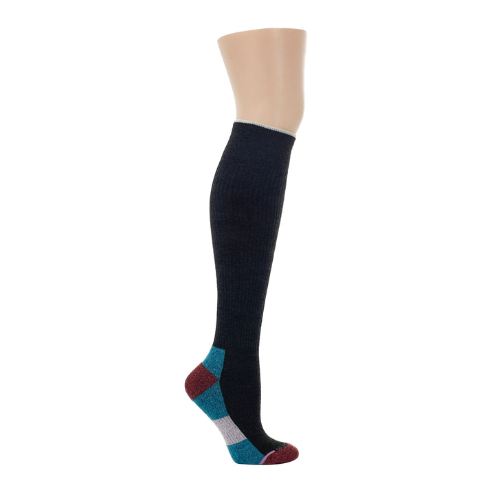 Knee-high socks featuring a color block design with a dark upper and multicolored patterned foot.