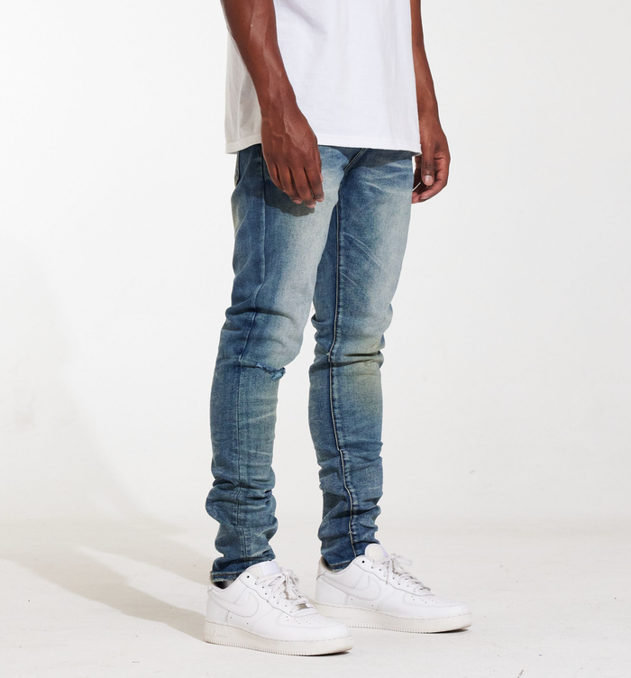 Close-up of the Crysp Denim Atlantic Medium Wash Denim Jeans (CRYSPSUM24-027) back pocket with brand logo embroidery