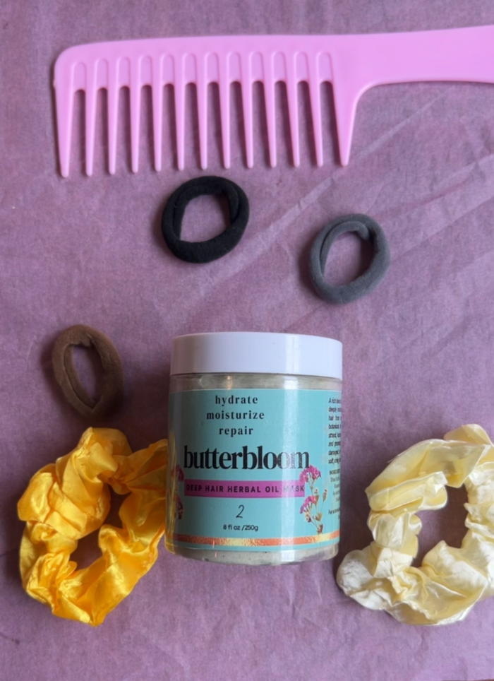 Butterbloom deep herbal hair and oil mask in an 8oz jar, showing a creamy herbal hair treatment with natural ingredients