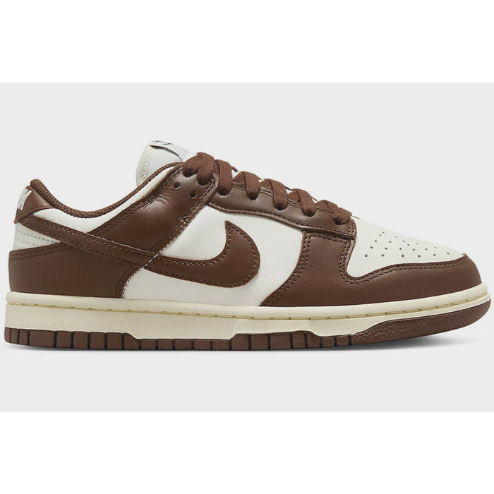 A close-up image of the Nike Dunk Low - Cacao Wow (W) (DD1503-124) women's sneaker in white and brown colorway
