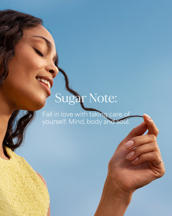 Woman holding a strand of hair with 'Sugar Note' branding and tagline.