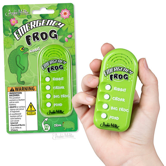 A hand holds the Emergency Frog, a green sound toy with buttons for different frog sounds.