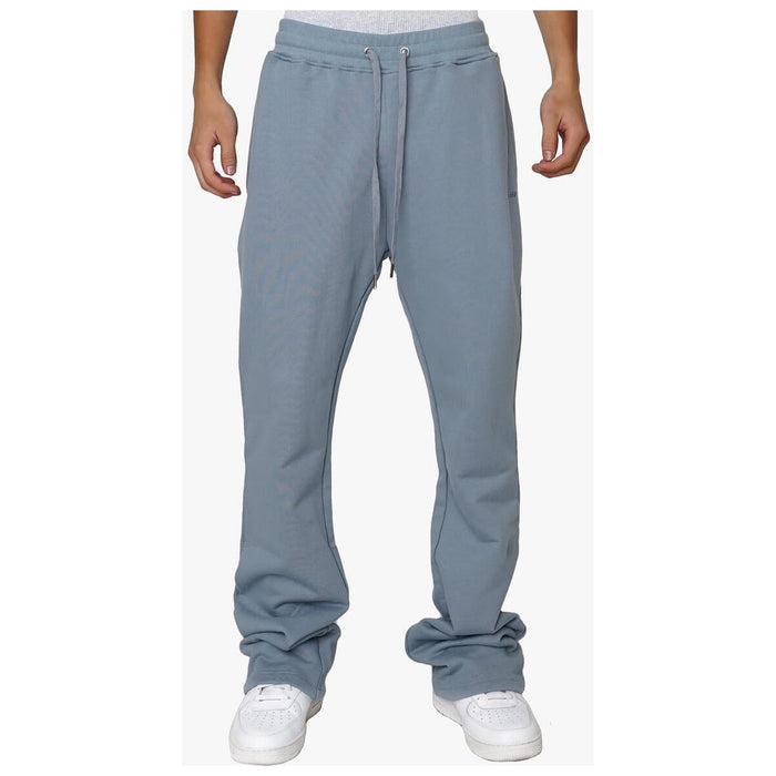 Front view of EPTM Perfect Flare Pants in Denim Blue, featuring pockets and belt loops