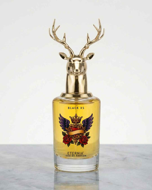 Eternia eau de parfum bottle with gold deer antler cap, labeled Black XS