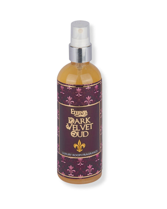 Eternia® Dark Velvet Oud room spray bottle with clear pump sprayer and purple-gold label.