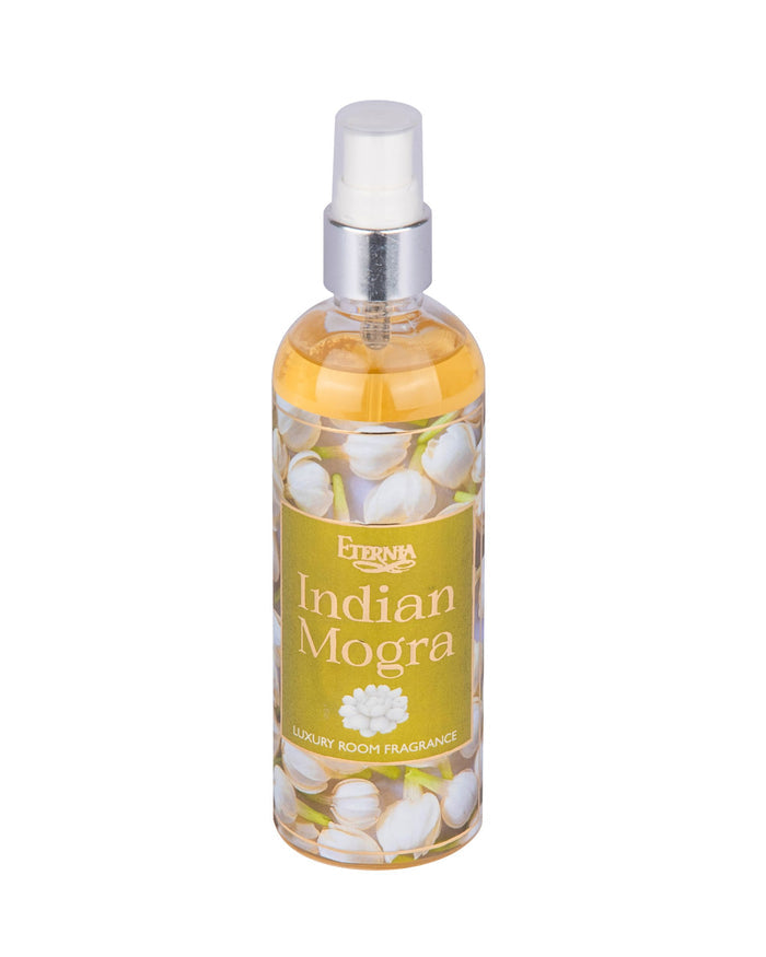 Indian Mogra room spray bottle with silver pump, clear bottle filled with pale flowers.