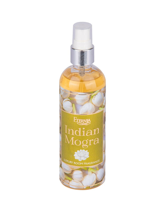 Indian Mogra room spray bottle with silver pump, clear bottle filled with pale flowers.