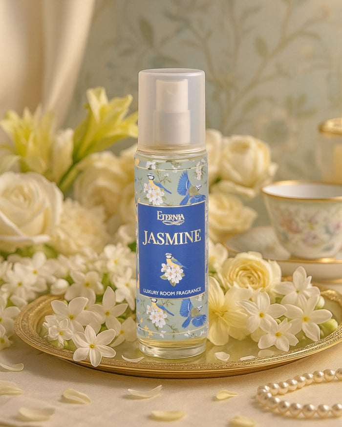 Eternia Jasmine room spray bottle on decorative tray with flowers and jewelry