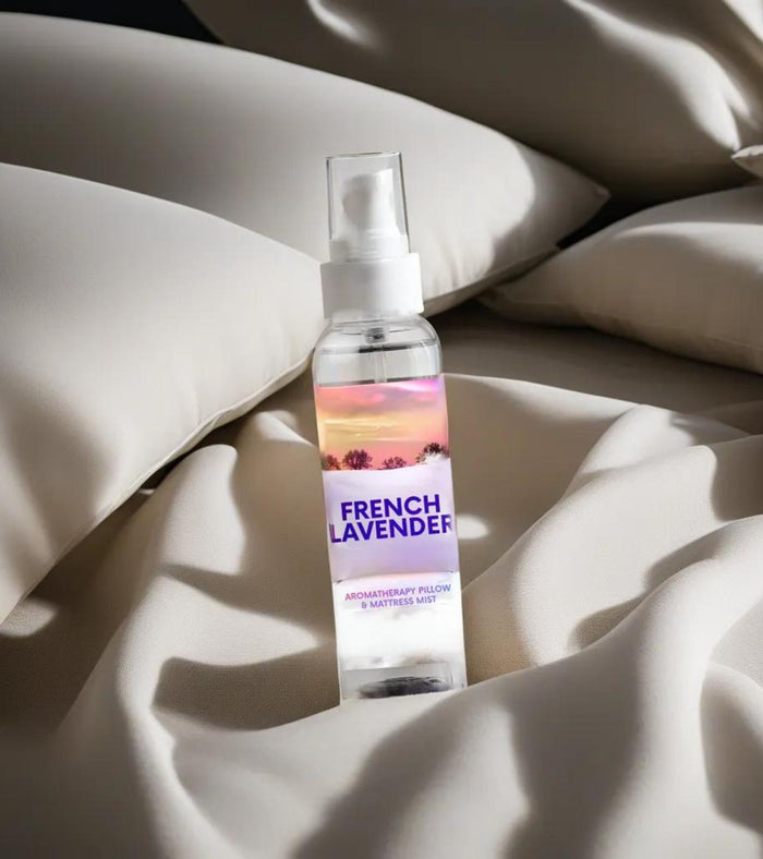 Eternia® French Lavender pillow mist spray bottle on white bedding with white pump