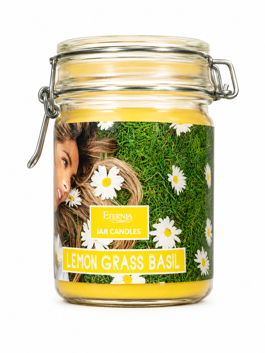 Jar candle in clear glass with metal clasp lid and green herb label with daisies