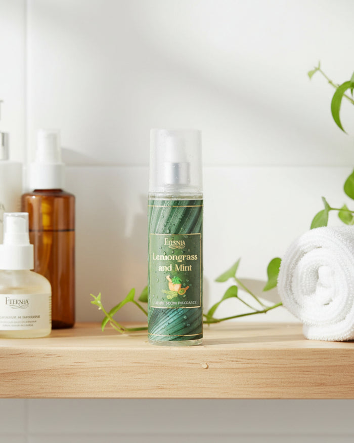 Luxury room spray bottle with white cap and green striped label on a wooden shelf