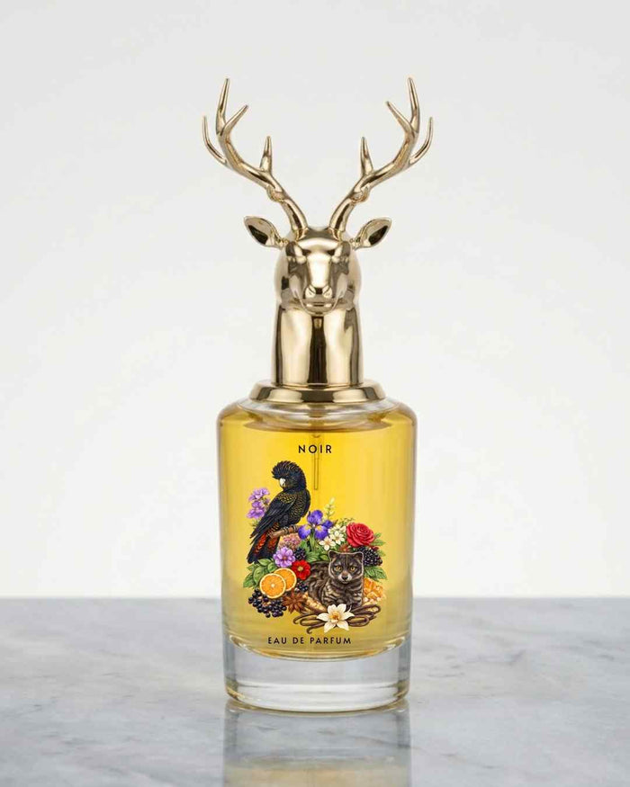 Eternia® Noir eau de parfum bottle with gold deer-head cap and gold liquid