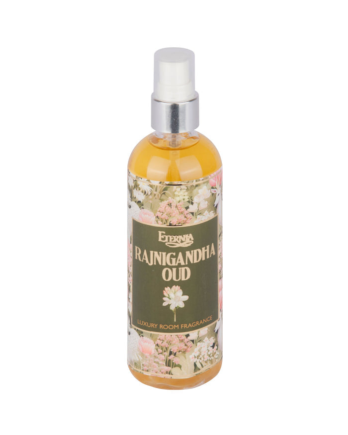 Eternia Rajnigandha Oud room spray bottle with white mist pump, amber liquid, green label