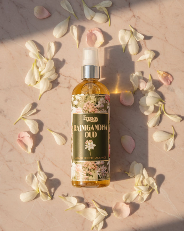 Eternia Rajnigandha Oud room spray bottle with white spray nozzle and amber glass