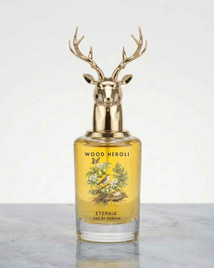 Eternia Wood Neroli Eau de Parfum bottle with deer head cap