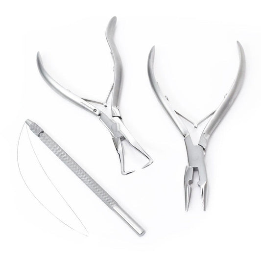 Two stainless steel dental tools and a curved dental needle rest on a white background, including a plier and forceps for procedures.