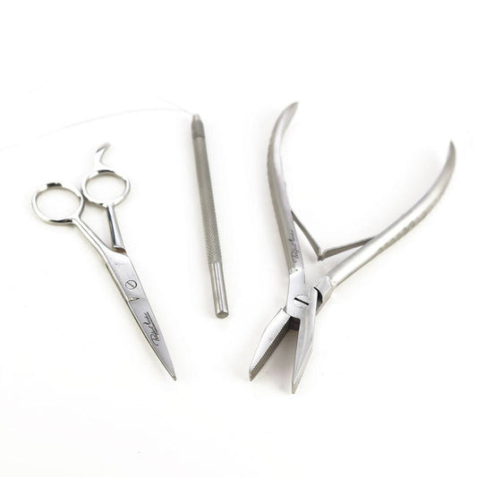 The Perfect Locks Hair Extension Tool Kit includes three stainless steel tools: scissors, a textured handle tool, and pliers.