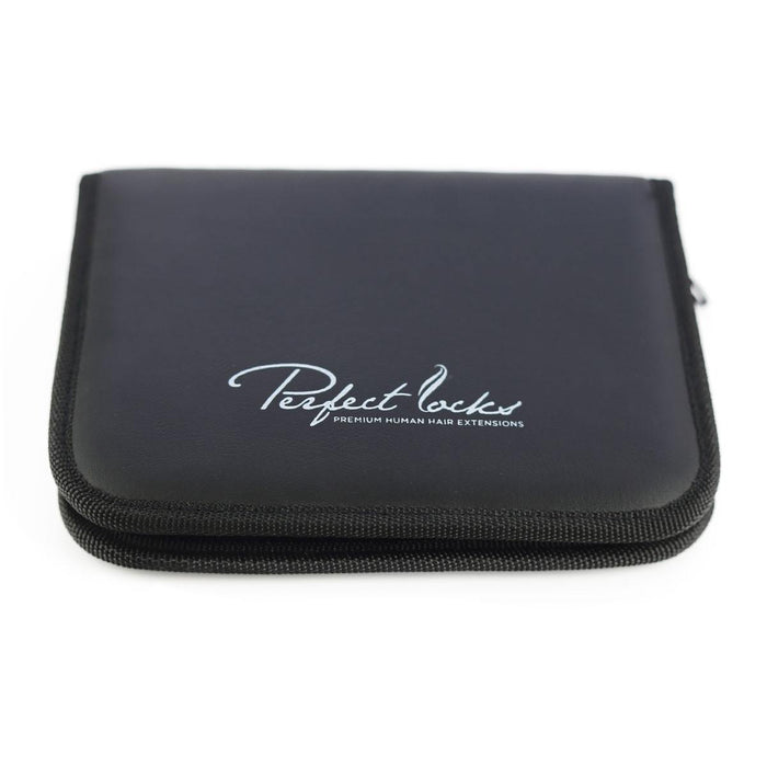 The Perfect Locks Hair Extension Tool Kit in a black zippered case with white script sits closed against a white background.