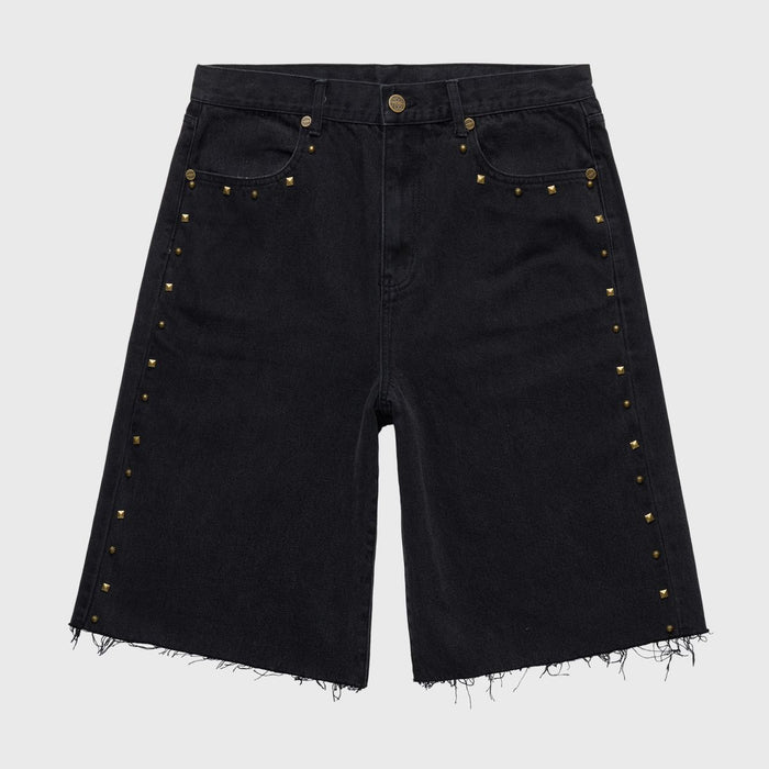 Close-up of Homme + Femme Studded Denim Shorts in Black Stone Wash, featuring distressed details and silver studs