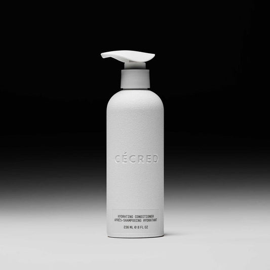 Cécred Hydrating Conditioner 236ml pump bottle displayed upright against a gradient black-to-white background