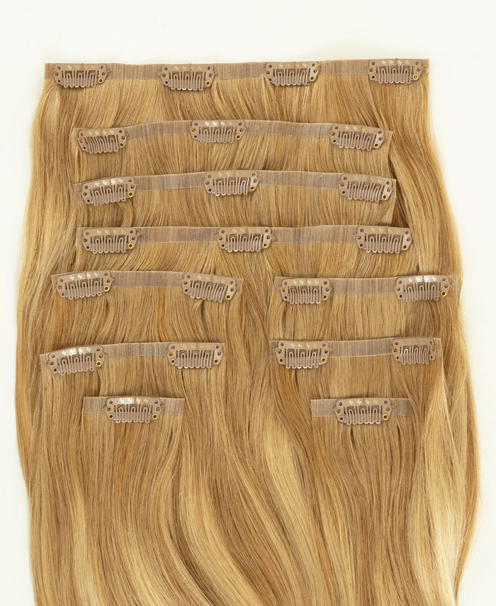 invisible clip-in hair extensions blonde balayage.