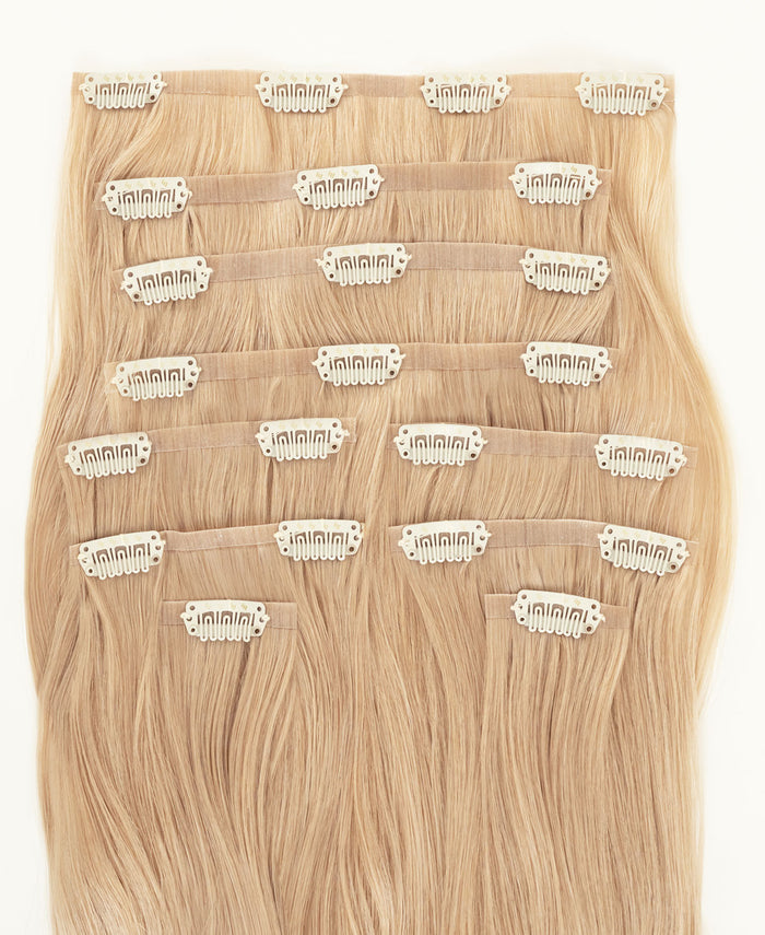 invisible clip-in hair extensions champagne blonde.