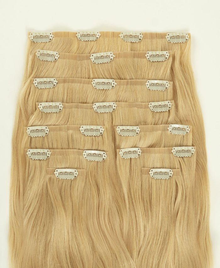invisible clip-in hair extensions dirty blonde.