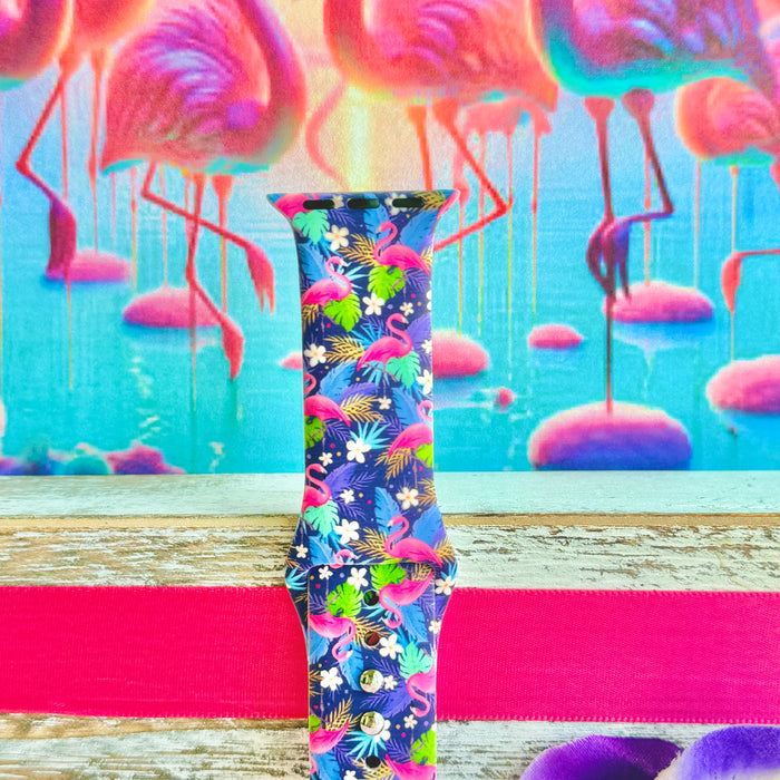 It's Giving Flamingo Apple Watch band with pink flamingos and tropical palm leaves on blue background with flamingo decorations