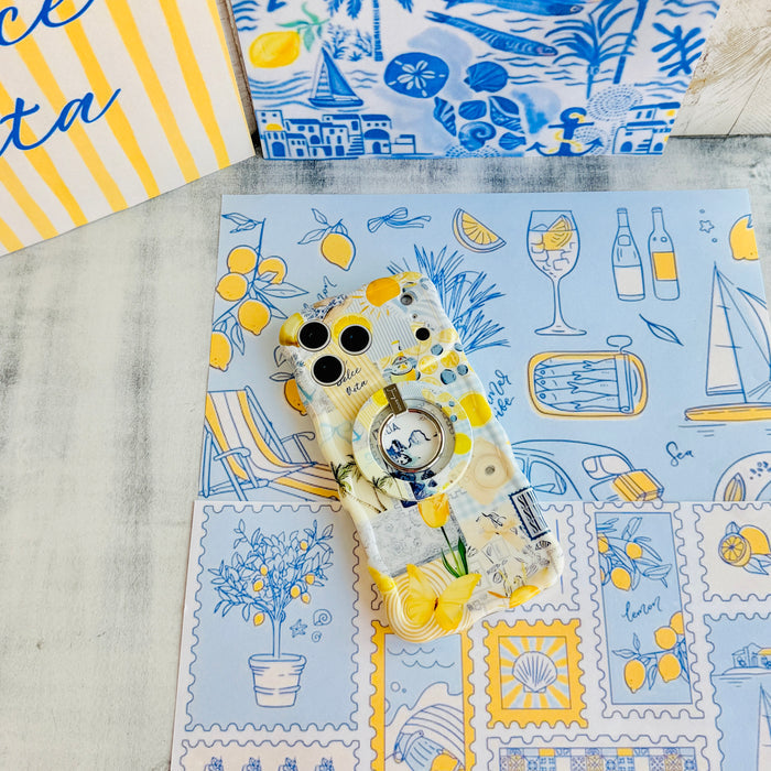 Trendy light yellow and blue wavy iPhone case featuring a Mediterranean collage of lemons, Capri travel stamps, and yellow tulips with a high-gloss finish.