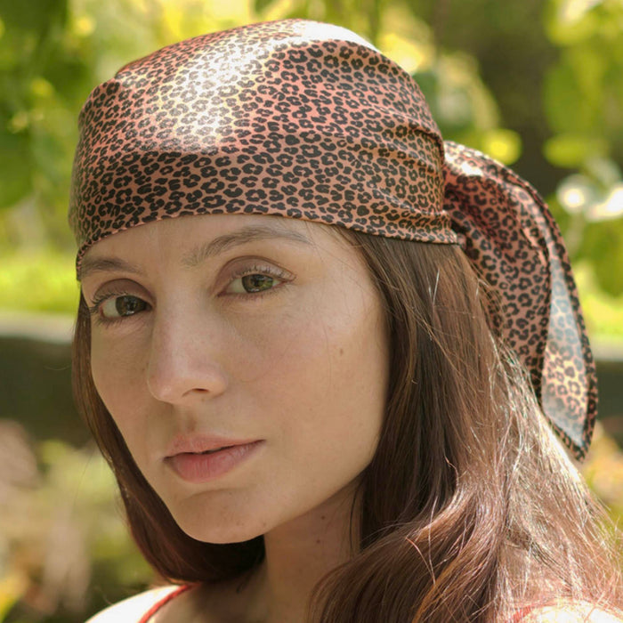Animal-print hair accessories collection designed for tropical escapes and holidays.