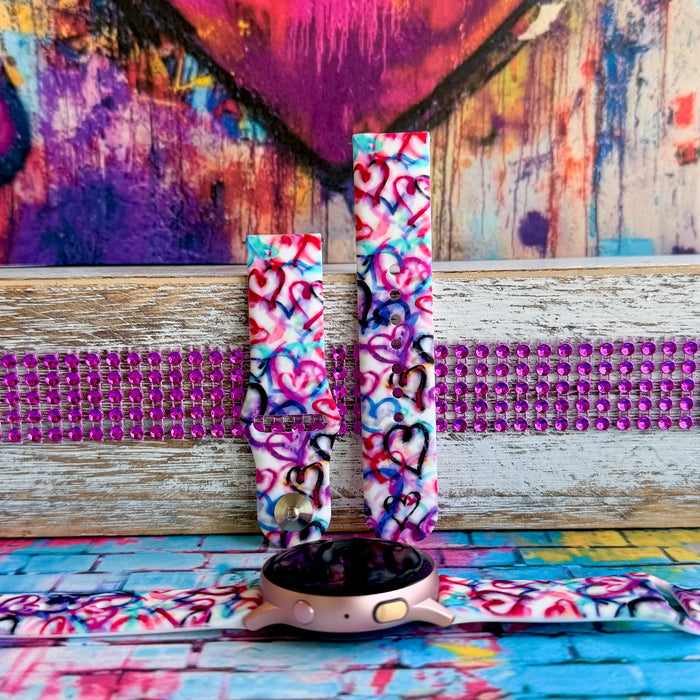 Bold graffiti heart silicone Samsung Watch band in pink, magenta, blue & teal. Street-art-inspired love print. Fits all Apple Watch models 38–49mm.