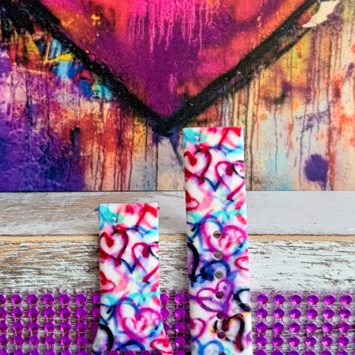 Bold graffiti heart silicone Samsung Watch band in pink, magenta, blue & teal. Street-art-inspired love print. Fits all Apple Watch models 38–49mm.