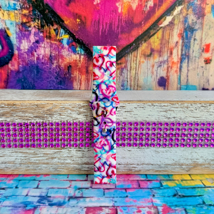 Bold graffiti heart silicone Samsung Watch band in pink, magenta, blue & teal. Street-art-inspired love print. Fits all Apple Watch models 38–49mm.