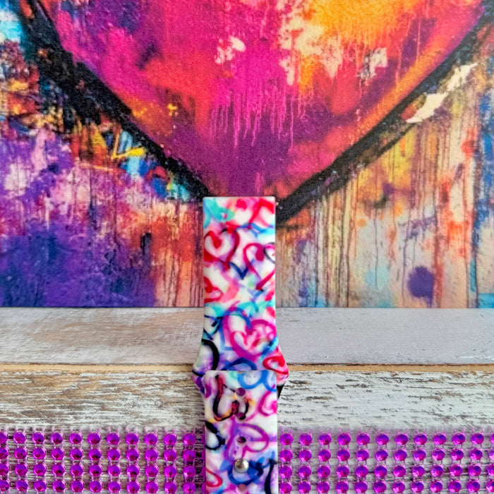 Bold graffiti heart silicone Samsung Watch band in pink, magenta, blue & teal. Street-art-inspired love print. Fits all Apple Watch models 38–49mm.