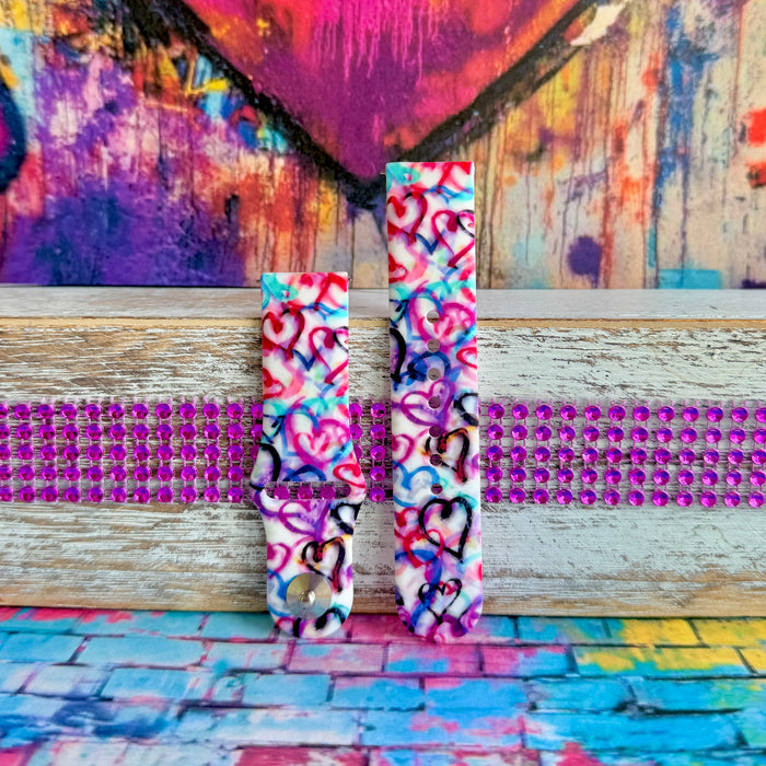 Bold graffiti heart silicone Samsung Watch band in pink, magenta, blue & teal. Street-art-inspired love print. Fits all Apple Watch models 38–49mm.