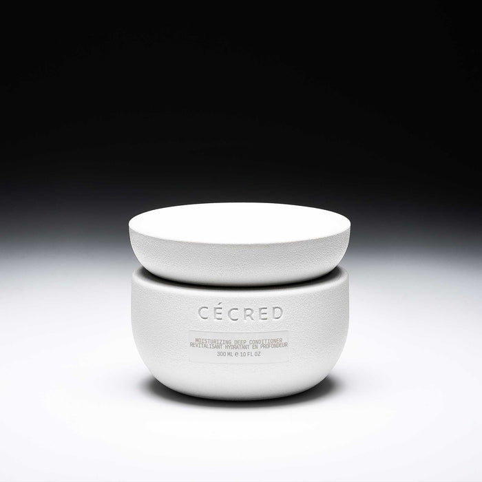 Cécred Moisturizing Deep Conditioner 300ml sculpted jar displayed against a gradient black-to-white background