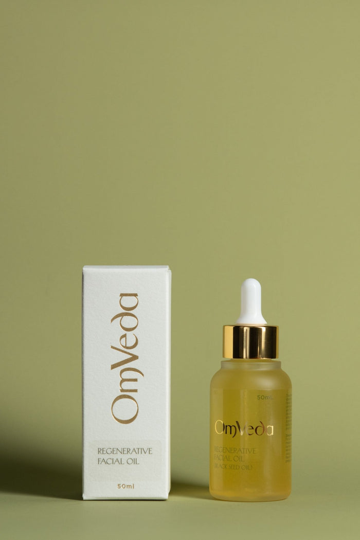 OmVeda regenerative facial oil set: box and amber dropper bottle, 50 ml